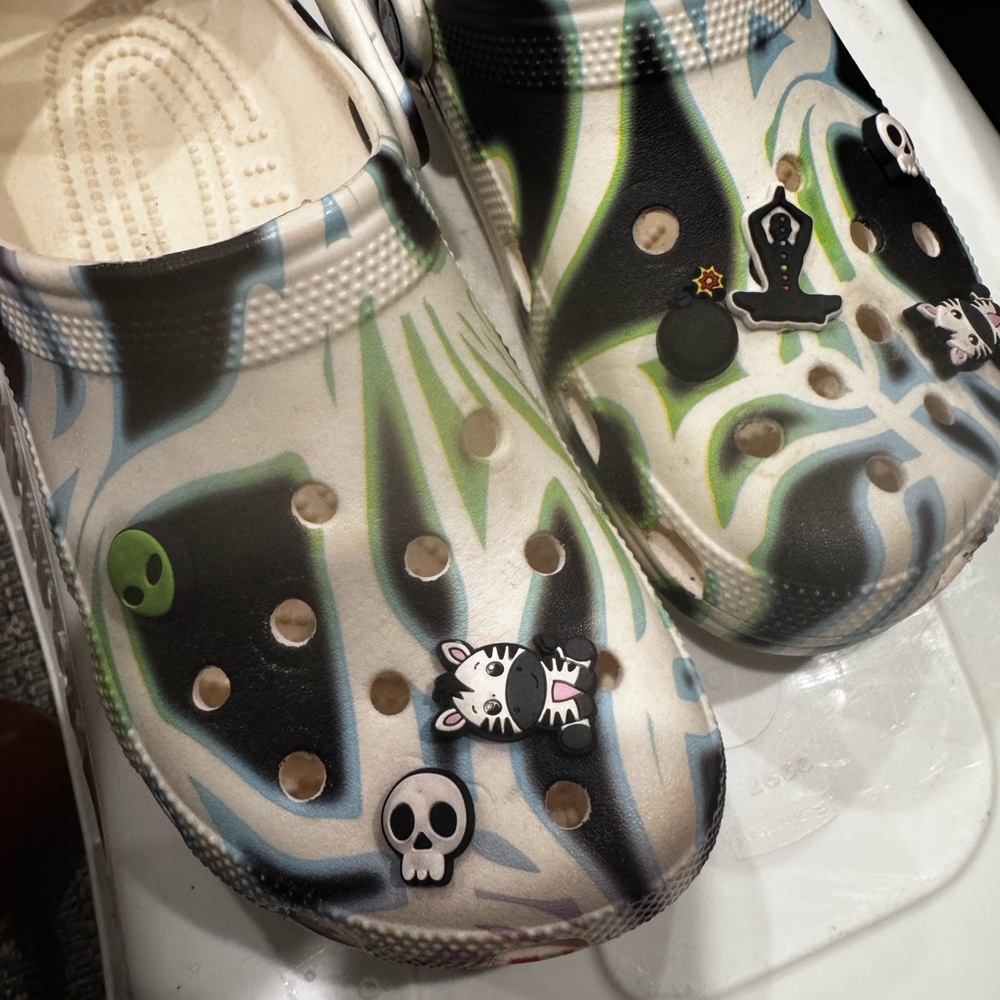 Adult unisex m7/W9 glow in the dark crocs with jibbitz included in photos